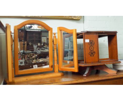 A triple dressing table mirror in pine frame, a small revolving bookcase and twelve blue and white plates 
