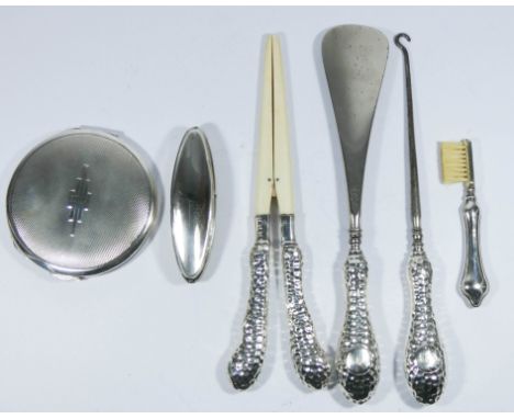 Art deco silver circular compact, silver handled dressing table implements - glove stretchers, nail buffer, shoe horn etc.