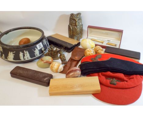 A collection of vintage artillery caps, old pens, drawing instruments, Wedgwood Jasper fruit bowl, onyx eggs and other collec