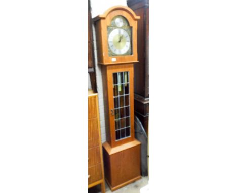 A modern chiming grandmother clock in light oak and lead lined case with brass and silver dial   Pendulum fittings damaged 