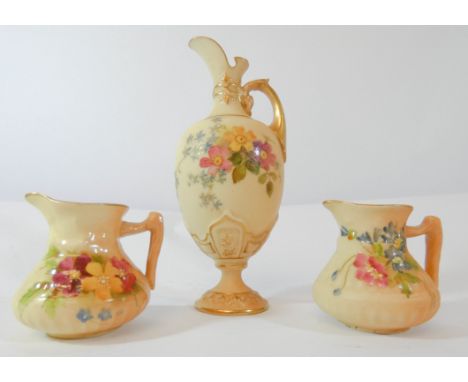 A collection of three Royal Worcester blush ivory jugs the largest ewer shaped jug numbered on base 1581 height 12.5cms 