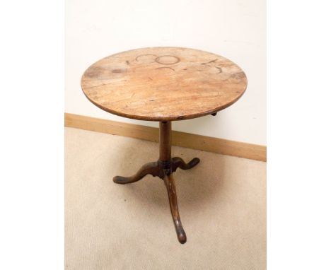 A circular mahogany occasional table on oak pillar and tripod base 