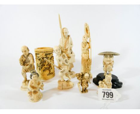 A collection of  late 19th century carved Japanese ivory figurines and Netsuke, nine pieces in the lot   