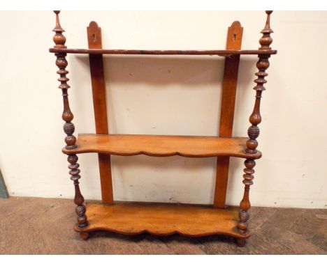 Late Victorian mahogany three tier wall shelf and an Edwardian three tier wall shelf 