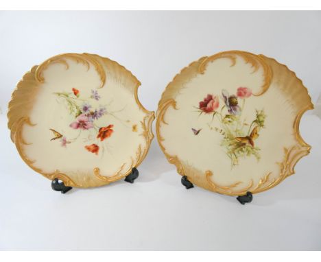 A pair of Royal Worcester blush ivory cabinet plates with shaped edges painted with poppies and moths   Items in good conditi