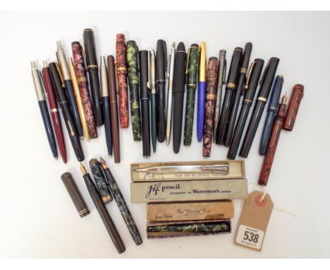 A large collection of early vintage fountain pens and ball pens to include: A Conway Stewart, boxed Dinky pen, Watermans, Bur