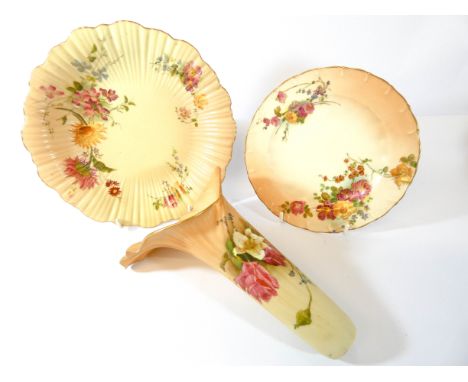 A collection of three pieces of Royal Worcester blush ivory to include two cabinet plates and a rose painted wall pocket, lar