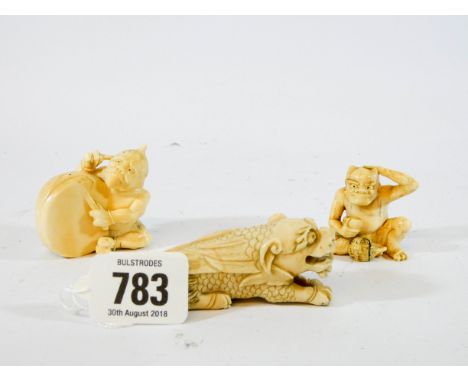 A group of three 19th century Japanese carved ivory Netsuke to include winged dragon 