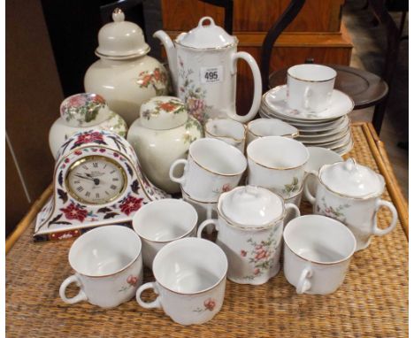 Floral decorated china coffee set, three ginger jars and a Royal Worcester mantle clock 