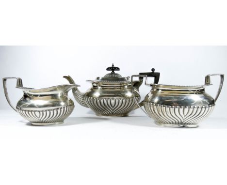 Hallmarked silver three piece tea service, Sheffield marks 1909 & 1911, gross weight 31.75 troy ounces all in 