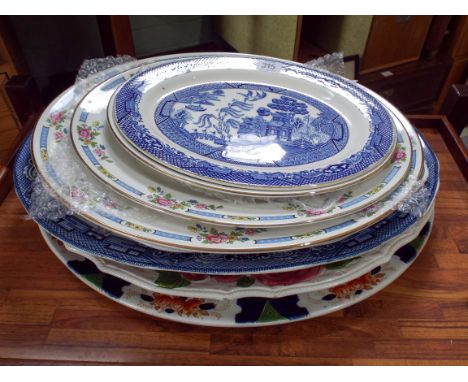 A collection of assorted meat plates 