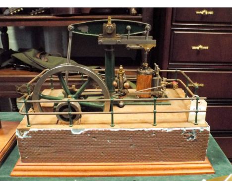A live steam model beam engine approx 15" x 8", 13" tall