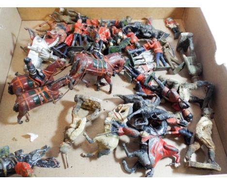 A collection of played with vintage lead soldiers 