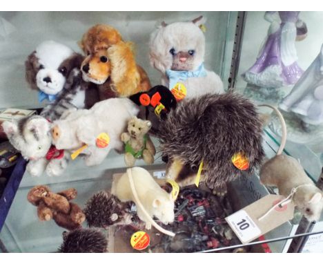 A collection of miniature modern Steiff bears and animals 