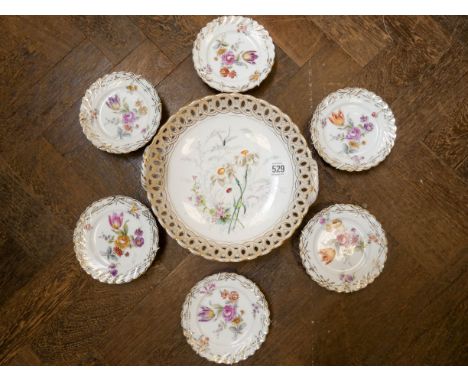 Continental porcelain twin handled basket with pierced edge painted with pheasant eye daffodils and six miniature Dresden flo