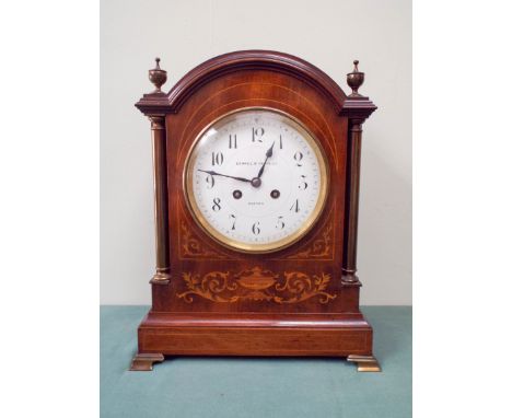 An Edwardian inlaid mahogany striking bracket clock stands 14" tall, 101/2" wide 