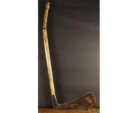 A 16th Century German Executioner's Axe. The 18 inch (46 cms) blade stamped with five makers marks and mounted on a later rus