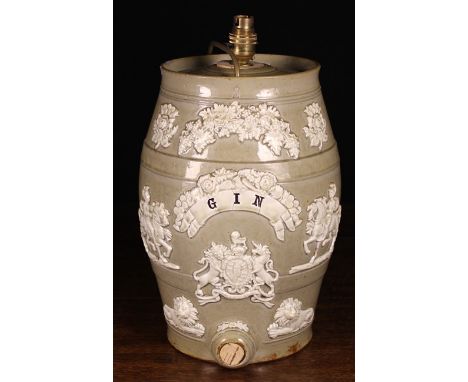 A 19th Century Relief Moulded Stoneware Gin Barrel converted to a lamp, 13¾ ins (35 cms) in height, and a Japanese blue & whi