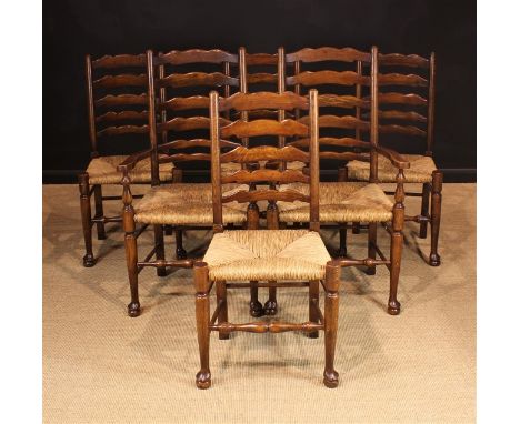 A Set of Six Lancashire Style Wavy Ladder Back Chairs with rush seats, including two armchairs. The side chairs with five gra