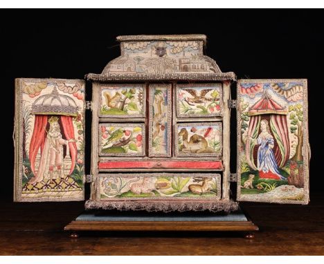 A Fabulous 17th Century Needlework Casket contained in a later glazed display case. The casket clad in fine tent-stitch panel