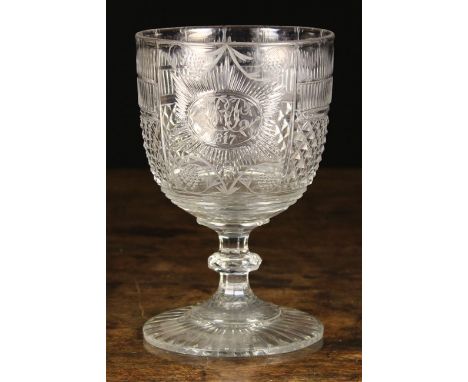 A Fine George III Cut Glass Rummer. The round bowl having comb fluting above fine diamond relief decoration and a cartouche p