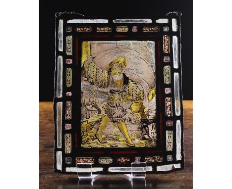 A Small Early 16th Century Stained & Leaded Glass Panel, probably German, depicting a man in landscape, initialed K and dated