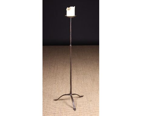 An Iron Candle Standard on tripod base, 37 ins (94 cms) high.
