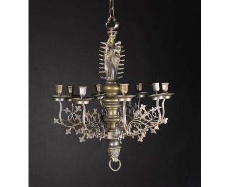 A 19th Century Neo-Gothic Eight-branch Chandelier. The knopped stem surmounted by cast figures of Madonna & Child emitting ra