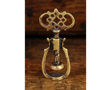 A Rare Late 17th/Early 18th Century Brass Screw Nut Cracker, 3 ins (7.5 cms) in height.