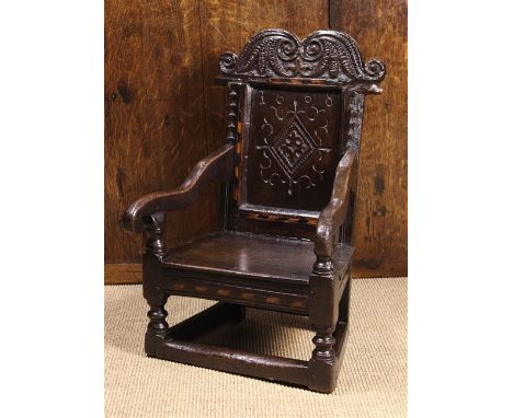 A Fine & Rare 17th Century Child's Inlaid Oak Wainscot Chair of small proportions, attributed to South Yorkshire and having a