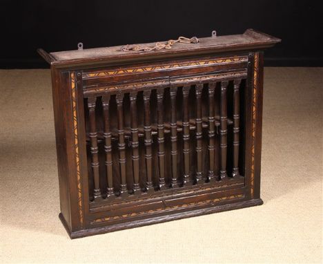 A Fine Spindled Oak Hanging Food Cupboard of generous proportions, rich colour & patination. The front having two ventilated 