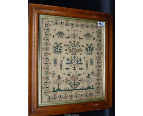 A burr Maple framed and glazed sampler by M.R, Finished on April 10, 1838, made in fine silks with swans, birds, animals, but