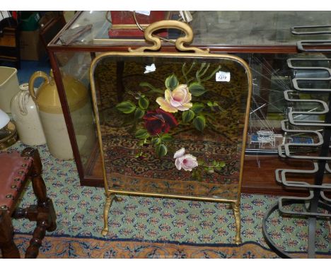 A Victorian Firescreen with rose painted design to the glass.