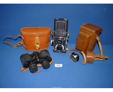 A Ricohflex model L TLR camera with a Riken 80mm f3.5 lens, Seikosha MXL shutter with lens hood and leather case and a pair o