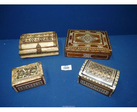 A brass mounted horn dome lid box having purple velvet interior, 5 1/2" long, a mixed woods and tortoiseshell box, 7" long, a