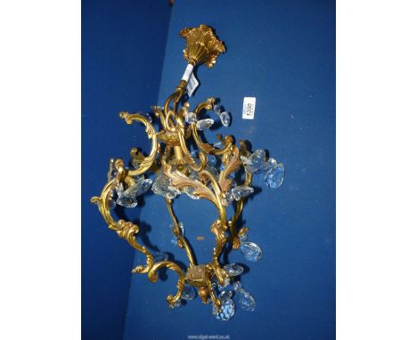 An electric Ceiling lamp with glass droppers.