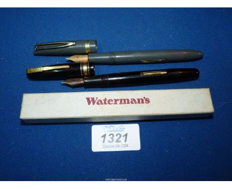 Two Waterman pens, both with 14k nibs, one boxed.