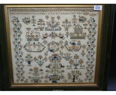 A dark green framed sampler by I.M, 1831 with fine stylised figures, angels, chapel, trees, horse, tree of life etc, with str