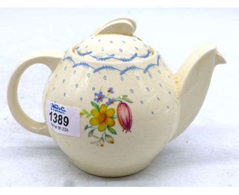 A 1930's Susie Cooper teapot in 'Printemps' pattern.