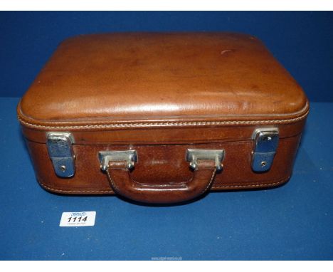 A leather vanity Case, 12 1/2" x 10" x 5".