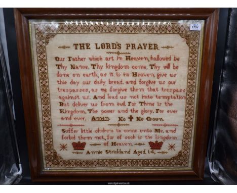 A Lords Prayer sampler by Annie Strickland, aged 14, 19th c. with crowns and border, 28 1/4'' x 27 1/4''.