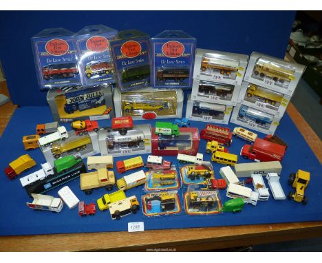 A quantity of model lorries, construction vehicles and buses including Matchbox, Corgi, boxed EFE etc.
