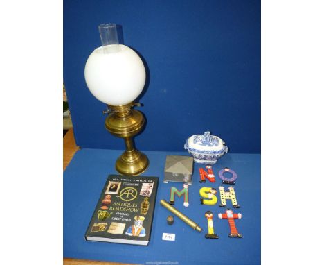 A box of miscellanea including a brass oil lamp with chimney and white glass shade, small blue and white tureen, small hammer