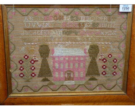 A burr Maple framed sampler by Elizabeth French, aged 9, 1839, showing a bright pink Georgian three storey house, oversized s