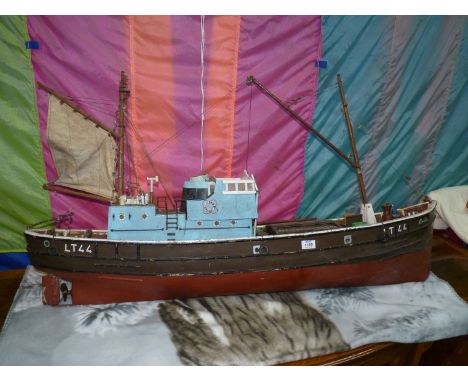 A large and quite nicely detailed model of a fishing trawler;  'LT 44 Cordelia', 47" long. Online research has not revealed a