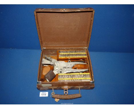 A vintage "Horstmann Ear Marker" punch, cased.