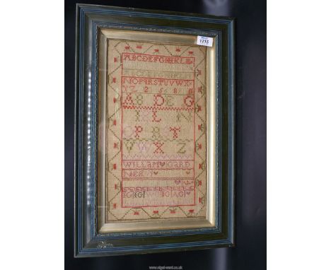 A framed and glazed alphabet sampler by Isabell Gardner, 1817, with strawberry border and family initials, sampler size 9'' x