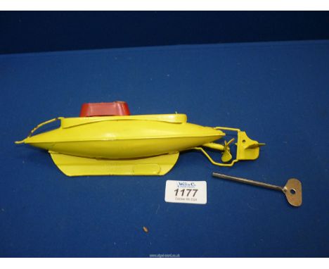 A vintage "Sutcliffe" clockwork Submarine, with key (in working order).