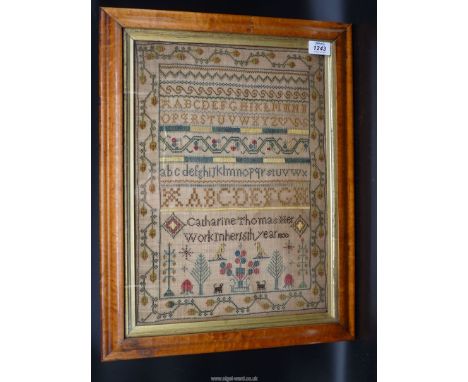 A framed and glazed sampler by Catherine Thomas, aged 16, (a rare sampler for one of this age), 1830, very high quality and c