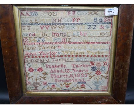 A framed and glazed family names sampler by Isabella Taylor, aged 12, March 8, 1833, 'Sunderland', 11 1/2'' square, some dama